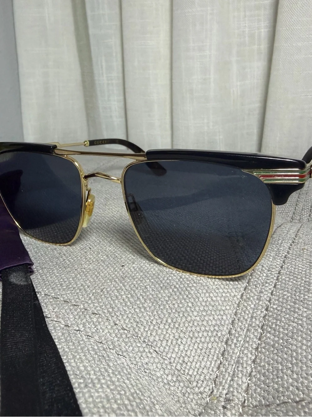 Gucci Black Lensed Sunglasses with Gold-Tone Frame